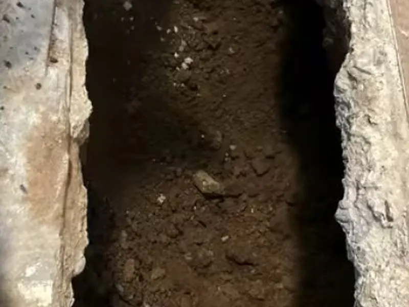 Excavated sewer line with pipe repair access for Plumber in Spring City, PA | Pottstown Plumbing Pros in Spring City, PA