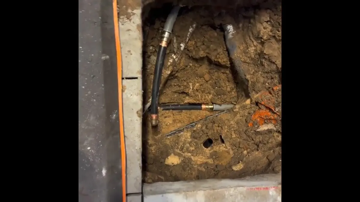 Opened concrete slab with exposed water line for Burst Pipe Repair in Pottstown, PA in Pottstown, PA