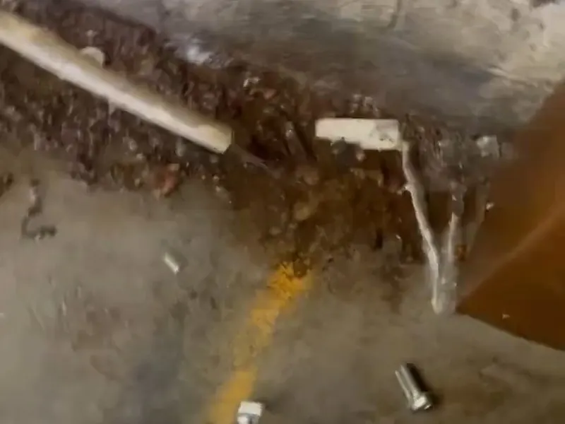 Opened concrete slab with exposed water line for Plumbing Services in Pottstown, PA | Pottstown Plumbing Pros in Pottstown, PA